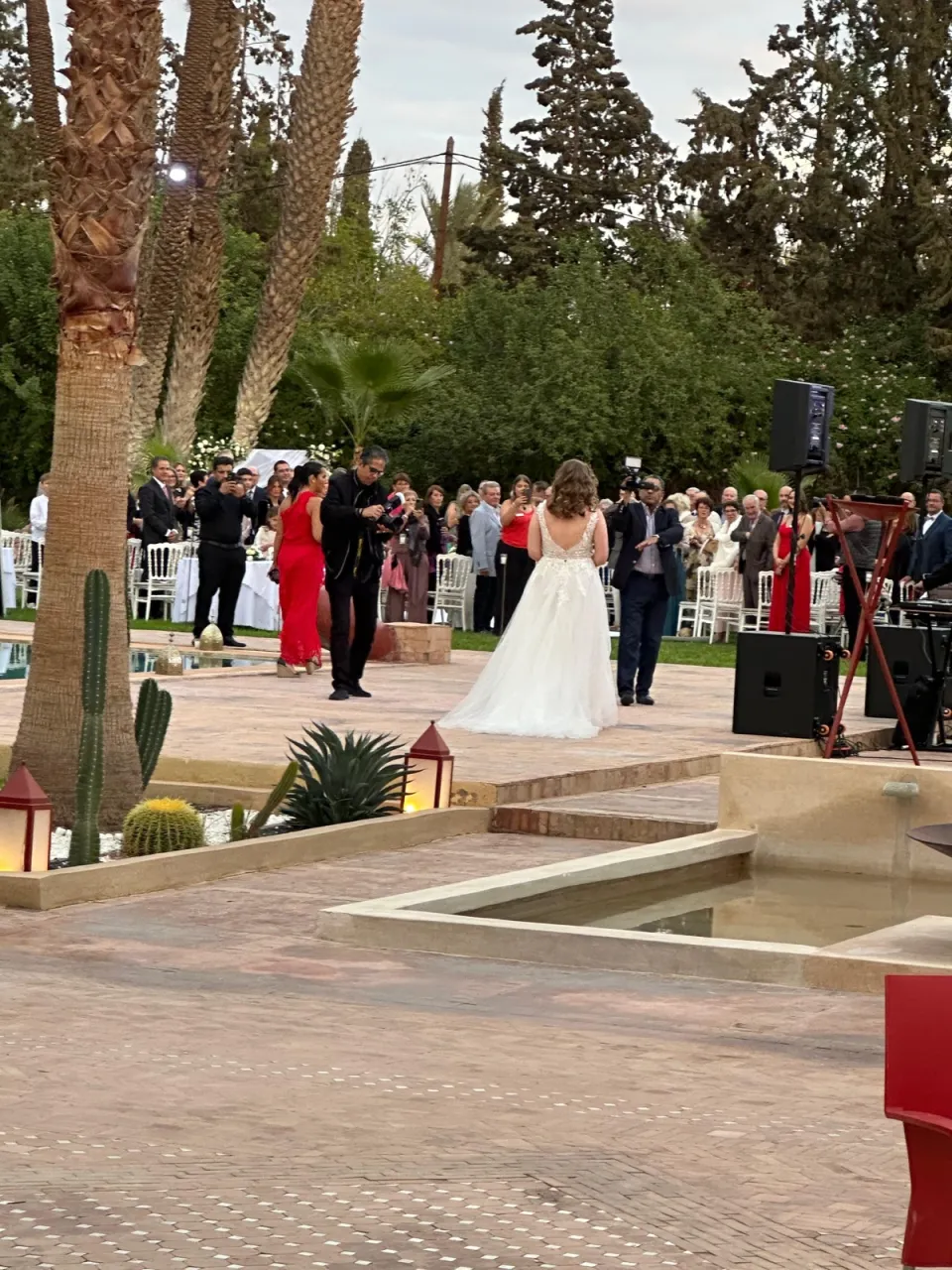 The bride facing her guests before the ceremony