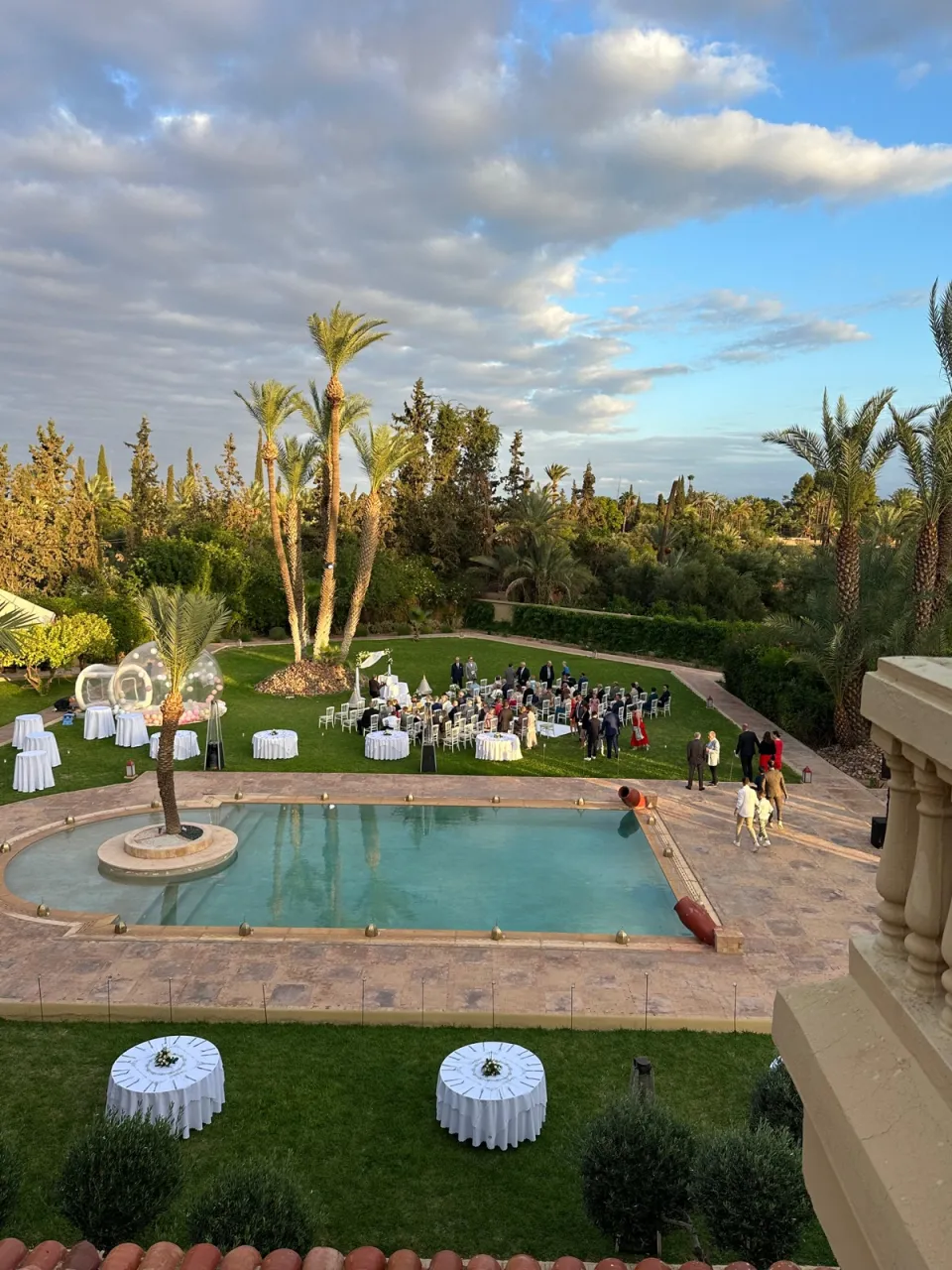 The estate at golden hour during the cocktail