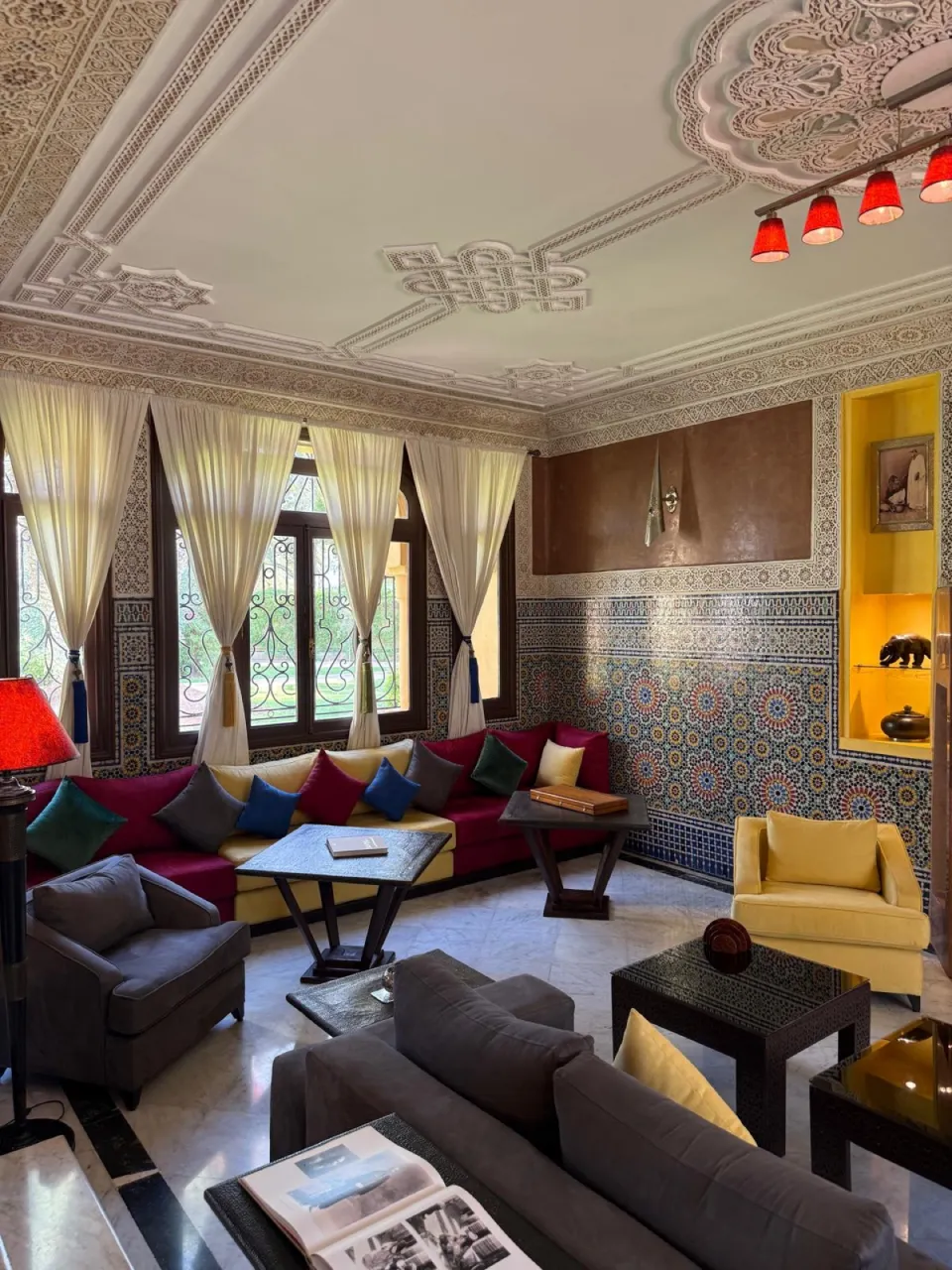 The Moroccan salon with zellige and sofas