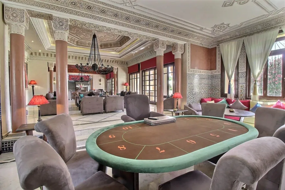 Poker table in the salon with zellige columns